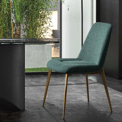 Set of 2 modern green upholstered side chairs perfect for a trendy dining room ambiance