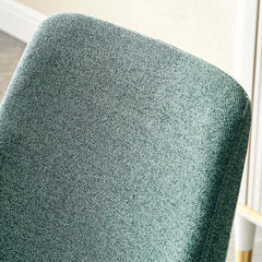 Pair of modern green dining chairs with linen upholstery for stylish and comfortable seating