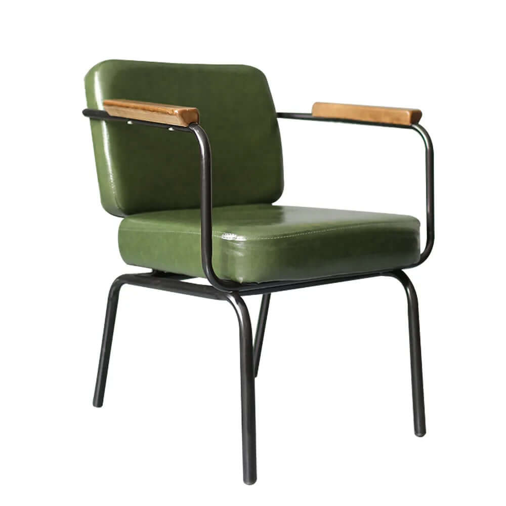 Vintage green upholstered dining chairs with metal armrests
