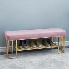 Stylish green velvet entryway bench with elegant gold frame and practical storage shelves