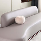 Modern 5-seater curved sofa with low back and sophisticated gray faux leather
