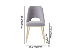 Trendy modern dining chairs in black upholstery with hollow back and elegant gold legs