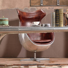 Vintage-style brown and silver leather chair with aluminum alloy frame for chic interiors