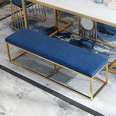 Modern blue velvet bench with gold metal frame, luxurious and elegant seating for bedroom or living room