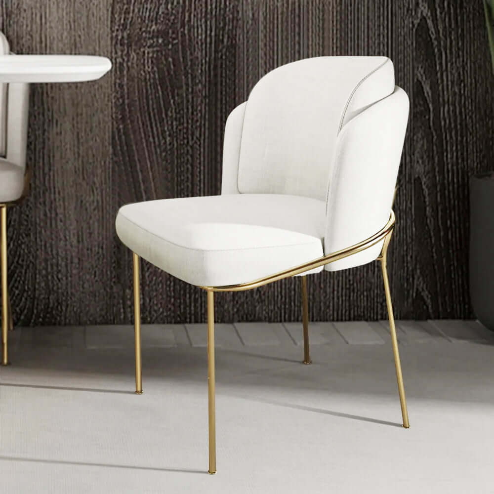 White dining chair upholstered in cotton & linen fabric with elegant gold finish Hauptbild