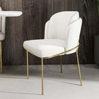 White dining chair upholstered in cotton & linen fabric with elegant gold finish