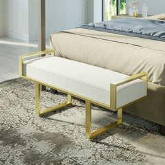 Gray linen upholstered ottoman bench featuring elegant gold legs, perfect for modern bedroom