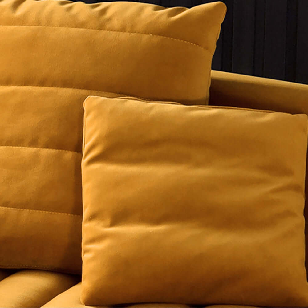 Yellow velvet upholstered sofa with comfortable seating for 3 people in luxury design