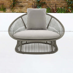 Outdoor Patio Rattan Barrel Chair with White Cushion Pillow for Relaxing in the Garden