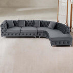 Curved gray velvet upholstered LShaped chesterfield sofa for stylish living rooms