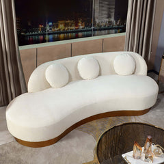 Chic white and gold velvet upholstered sofa with stainless steel base and cushions for 3 people