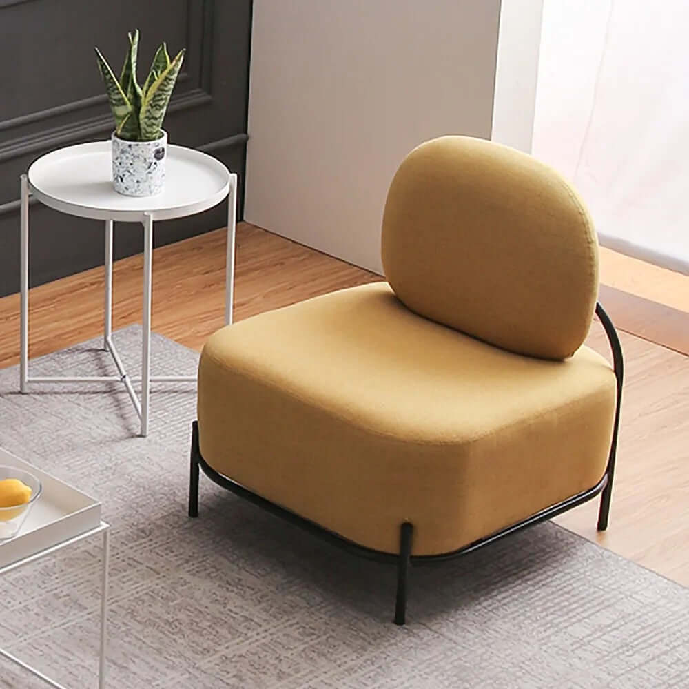 Sleek black leg armless accent chair with yellow linen upholstery