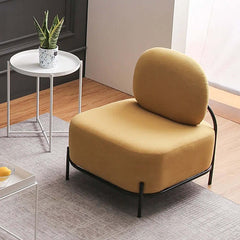 Sleek black leg armless accent chair with yellow linen upholstery