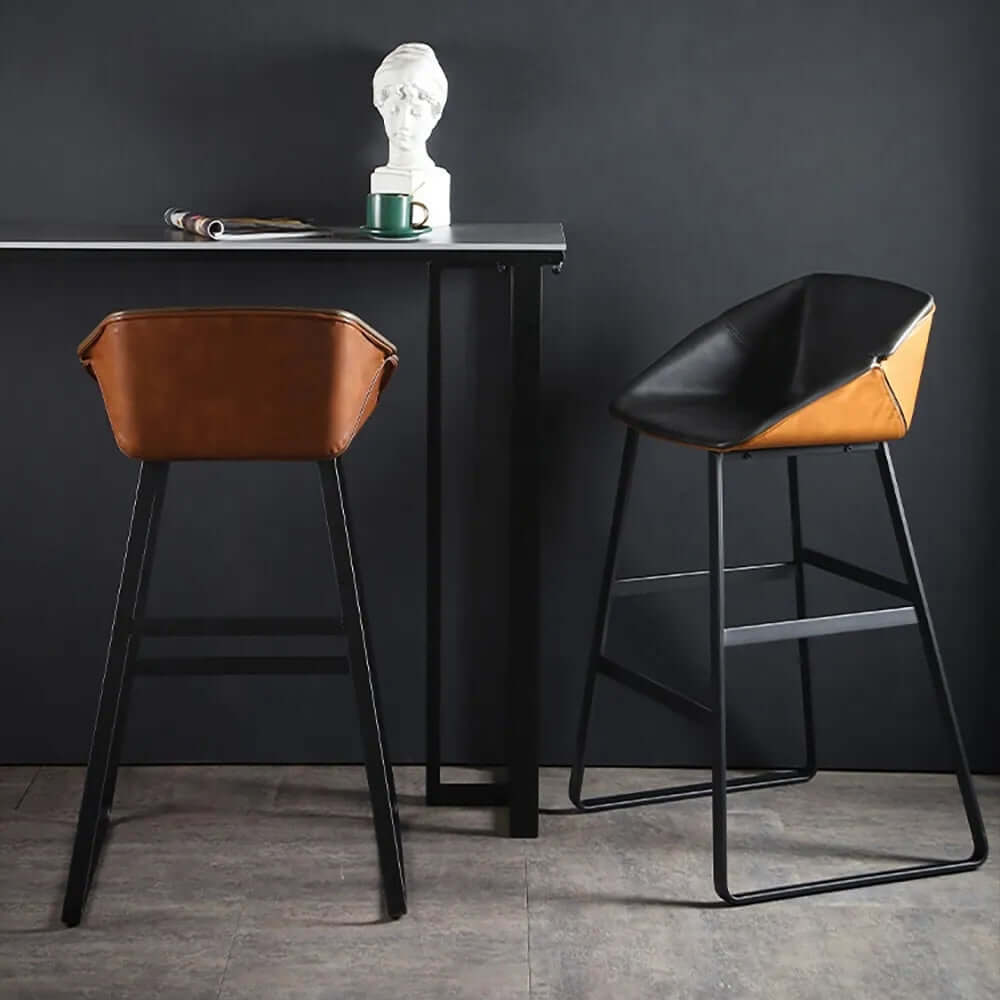 Black metal bar stool with faux leather upholstery for comfortable seating