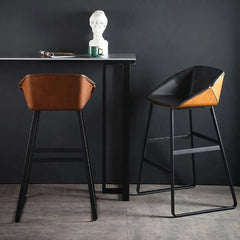 Black metal bar stool with faux leather upholstery for comfortable seating