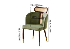 Modern green velvet dining chair with curved back design for comfortable seating