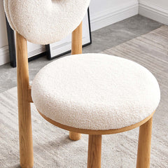 Trendy white boucle upholstered dining seat