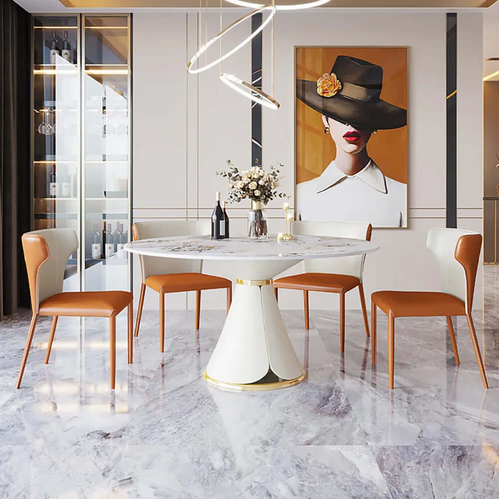 White round stone-top dining table with a golden stainless steel pedestal frame and gray-gold ink-painting tabletop