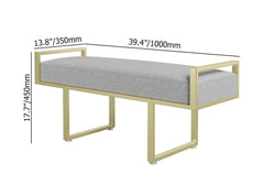 Gray linen upholstered ottoman bench with gold legs, ideal for adding style to entryway