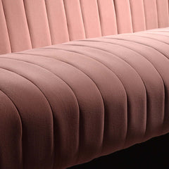 Elegant 2-seater sofa in pink velvet upholstery with luxurious channel tufting