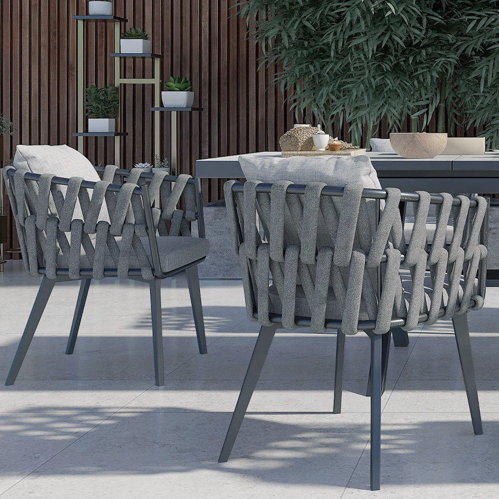 Outdoor dining set with extendable ceramic table and woven aluminum armchairs, 7 pieces
