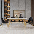 Pair of stylish black upholstered dining chairs with hollow back and metallic gold legs