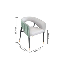 Green velvet upholstered dining chair with modern design and metal accents