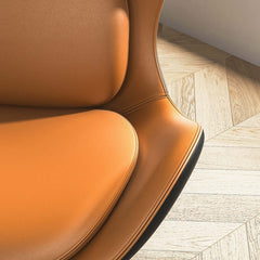 Trendy orange and black accent chair crafted with soft and durable PU leather upholstery