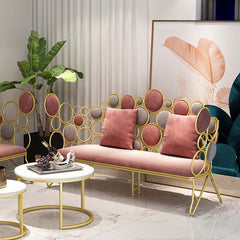 Pink velvet upholstered loveseat sofa with gold metal legs