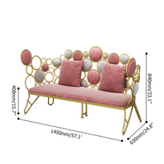 Stylish pink velvet sofa with sleek gold metal legs for home decor