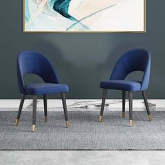 Contemporary blue velvet dining chair with curved back, perfect for a set of 2 in a modern setting