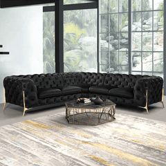 Modern black velvet sofa with metal legs and comfortable upholstery