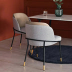 Gray upholstered armchair set with linen cushion