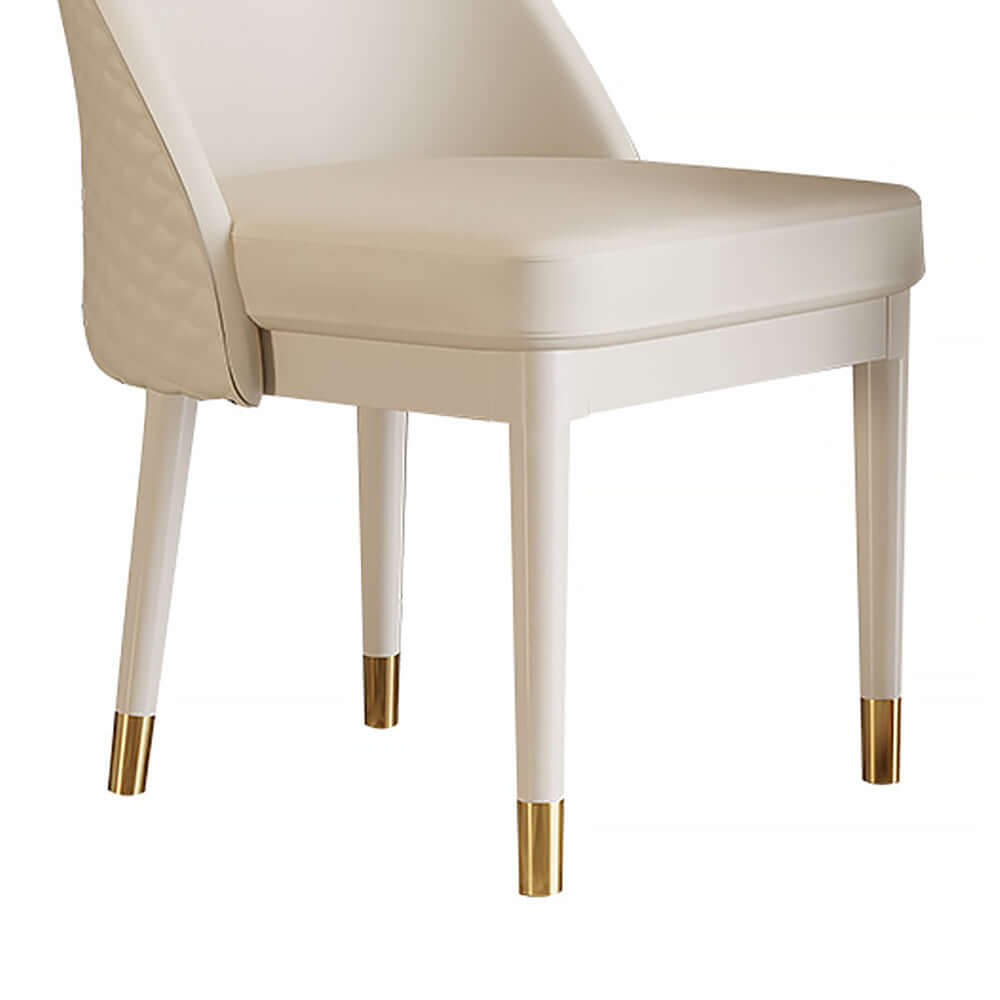 Faux leather beige dining chair designed with minimalist aesthetic and solid wood structure