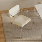 Sleek PU leather upholstered white dining chair with arms for stylish and comfortable dining