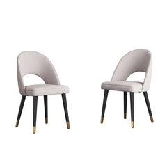 Elegant upholstered blue dining chair with a sleek curved back, perfect for a set of 2