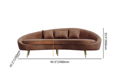 Modern pink velvet sofa with curved design, gold metal frame, and toss pillow, 63 inch length