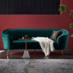 Modern deep green velvet sofa with metal legs in elegant design for contemporary living room