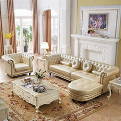 Elegant Champagne 4 Seater Chesterfield Sofa with Ottoman in Upholstered Faux Leather