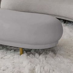 White upholstered bench with elegant metal legs