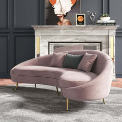 Elegant 63 inch curved sofa in pink velvet with gold metal base and included toss pillow