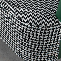 Chic houndstooth accent chair in green featuring upholstered linen seats