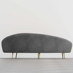 Pink velvet curved sofa with gold metal base, modern design, 63 inch length, includes toss pillow