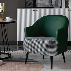 Green linen upholstered accent chair with modern houndstooth pattern