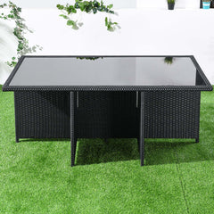 Rattan dining set with 7 pieces and glass top table for outdoor leisure