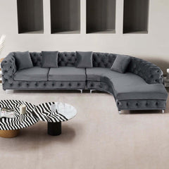 Modern LShaped chesterfield sofa with curved design in luxurious gray upholstery