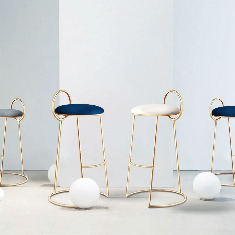 Stylish gray velvet counter height barstool with low back and elegant gold legs for modern appeal