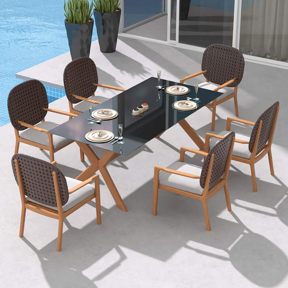 Teak wood outdoor dining set with glass top table and rattan armchair メイン画像