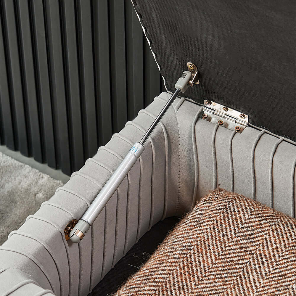 Fashionable gray velvet bench with gold legs for stylish interiors