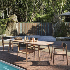 7-piece modern outdoor dining set featuring teak wood table and chair in natural finish